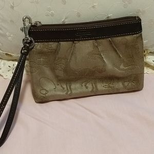 Coach horse and carriage wristlet